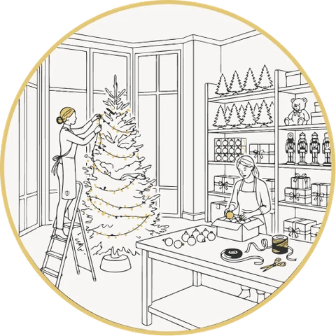 In the workshop, one florist strings lights on a tree while another prepares the ornaments
