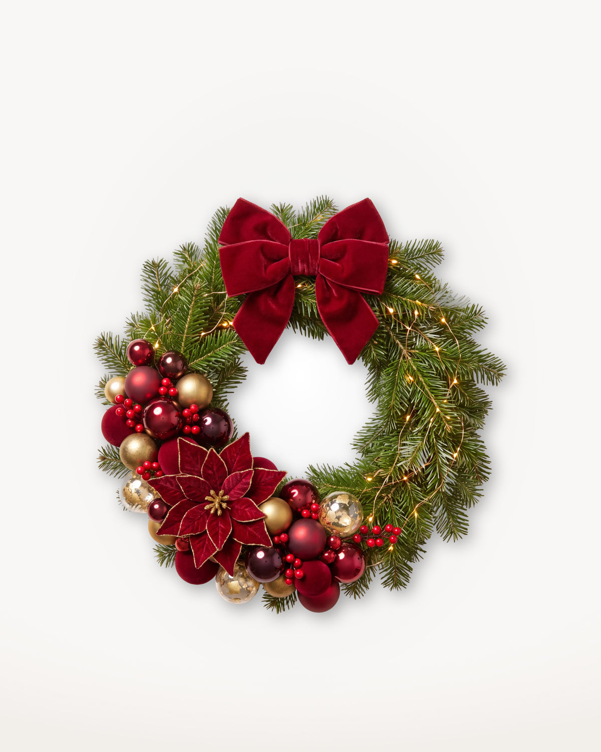 Couronne de Noël Grand Apparat Opéra de 50 cm : nœud de velours rouge, poinsettias et boules rouge et or 