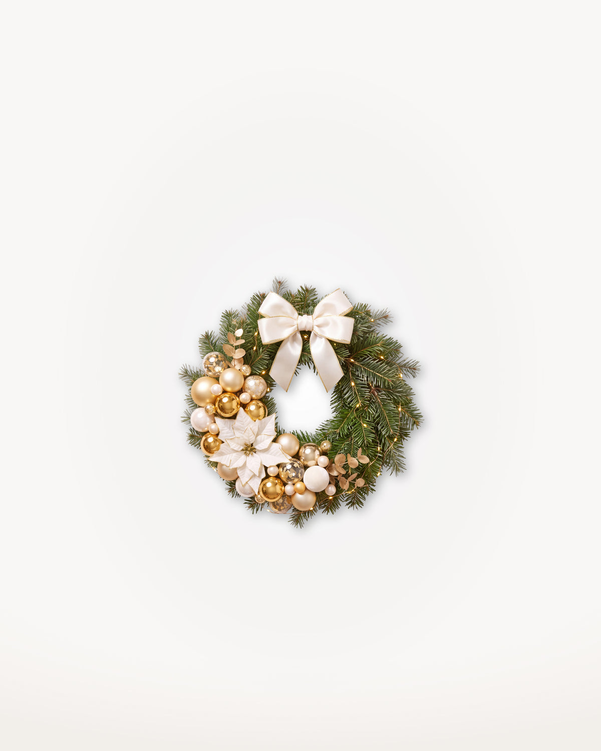 Couronne de Noël Grand Apparat Sacré-Cœur de 30 cm : nœud de satin ivoire, poinsettia blanc et boules or 
