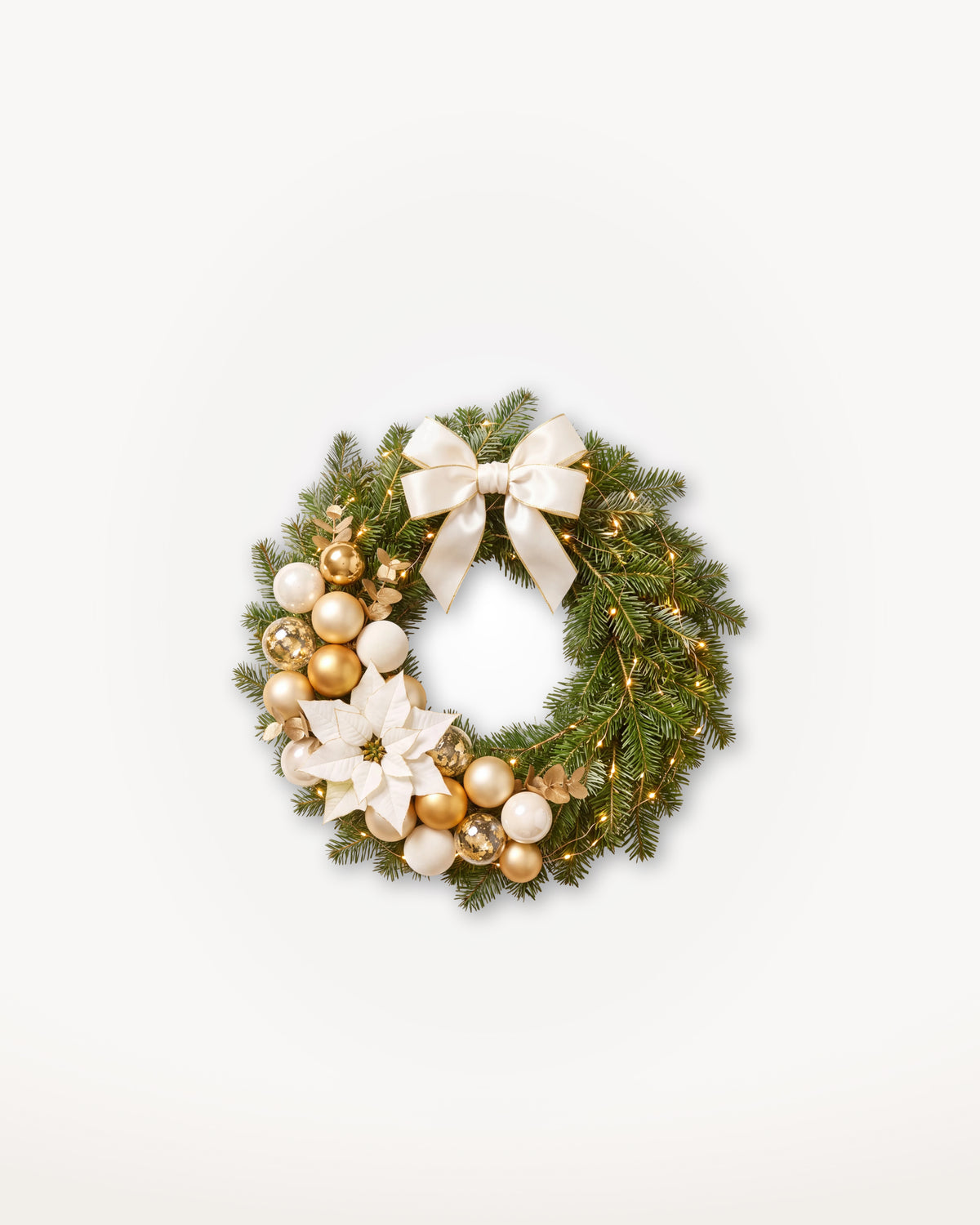 Couronne de Noël Grand Apparat Sacré-Cœur de 40 cm : nœud de satin ivoire, poinsettia blanc et boules or 