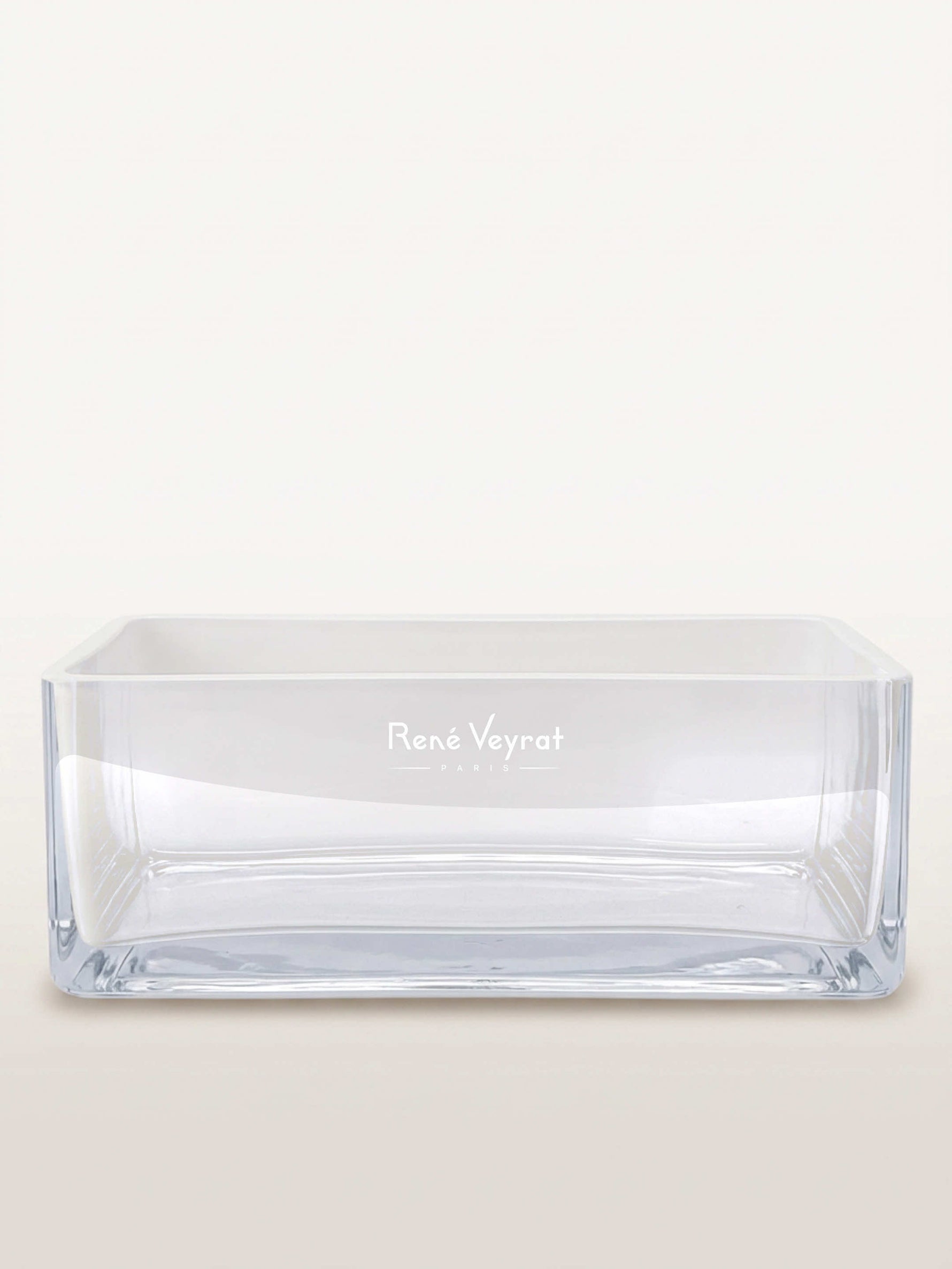 Contenant rectangulaire en verre transparent, gravé « René Veyrat Paris », vide